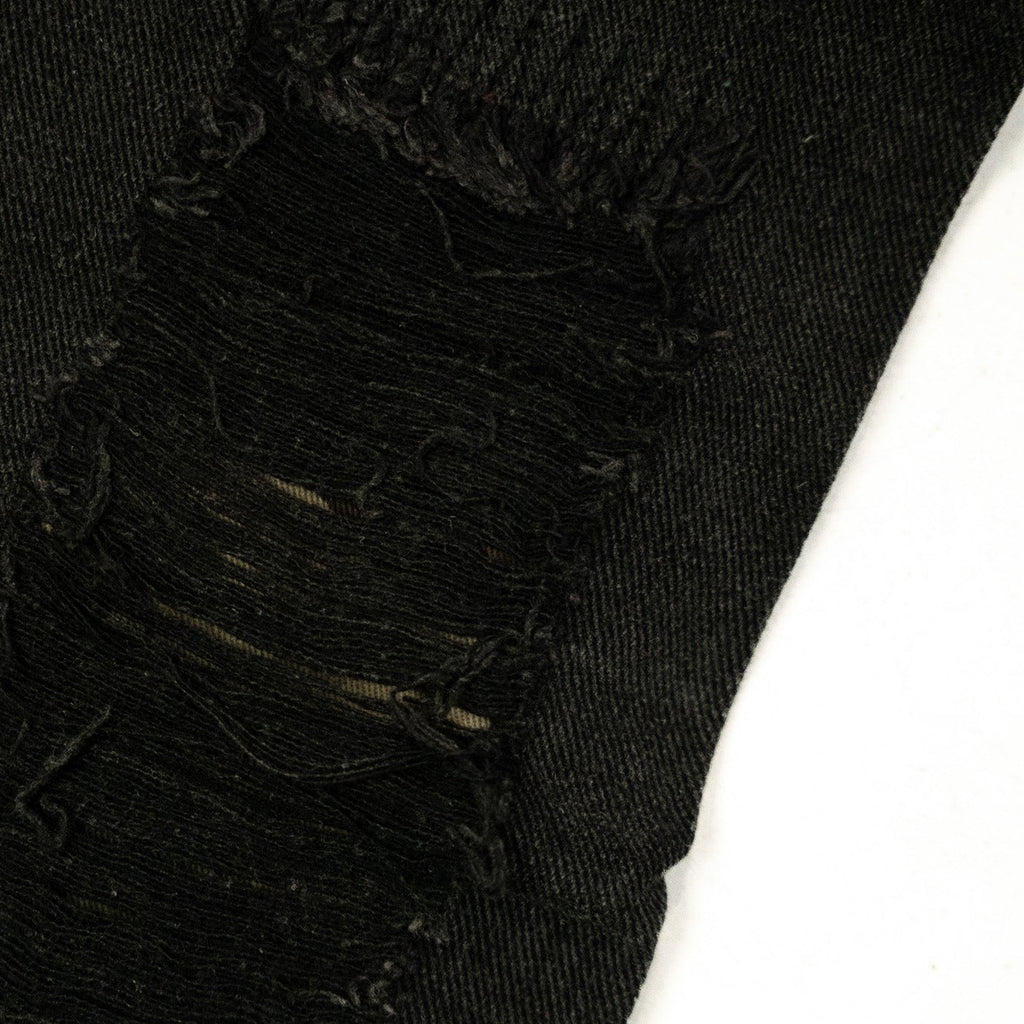 REBEL CAMO FLARE JEANS