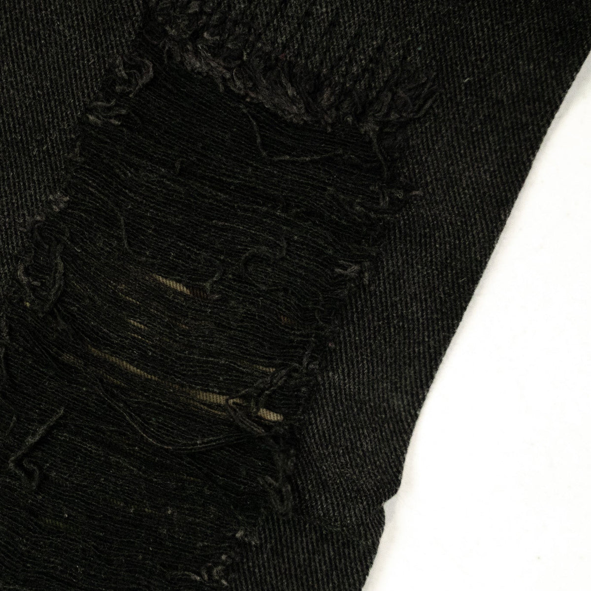 REBEL CAMO FLARE JEANS