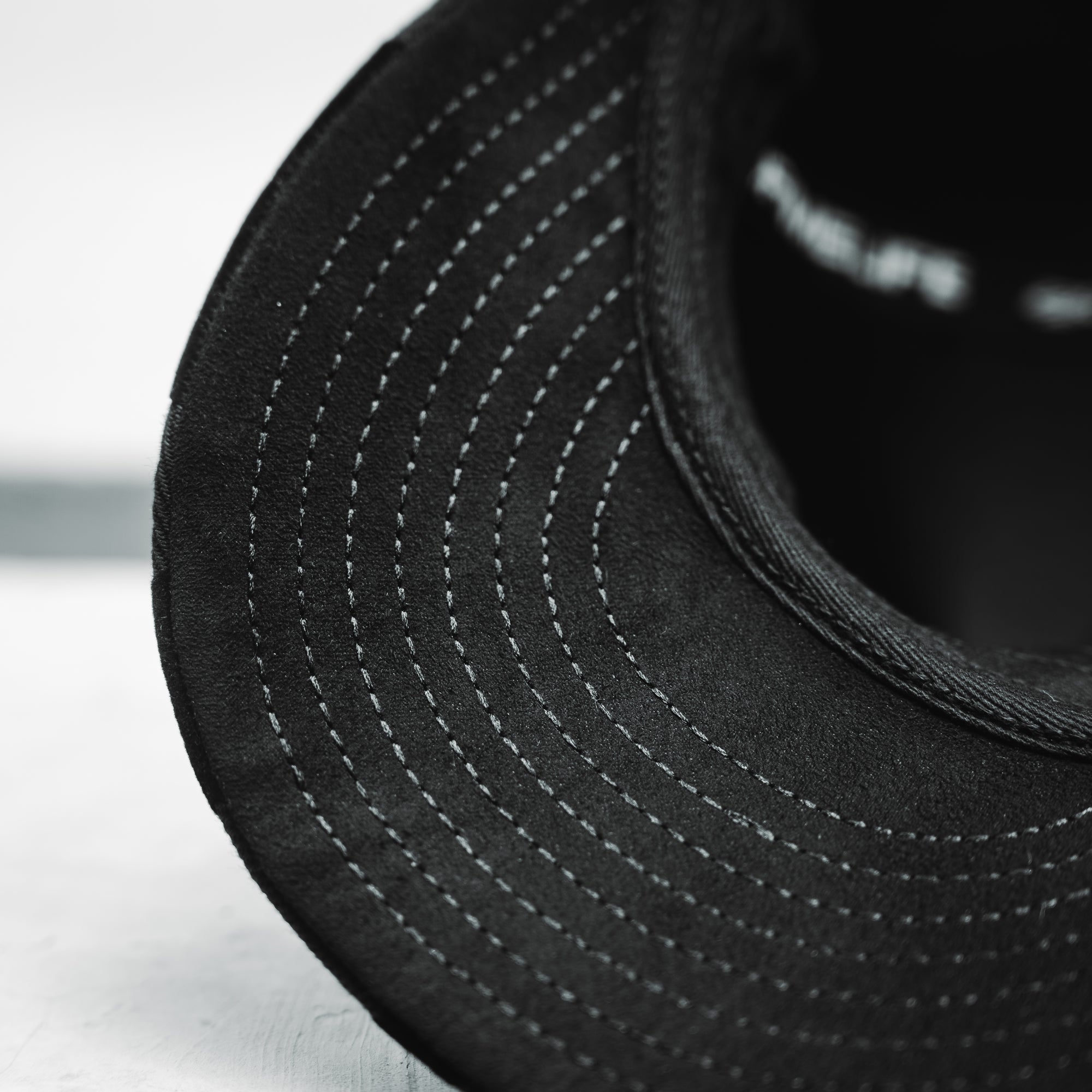 CL SUEDE MONOGRAM CAP