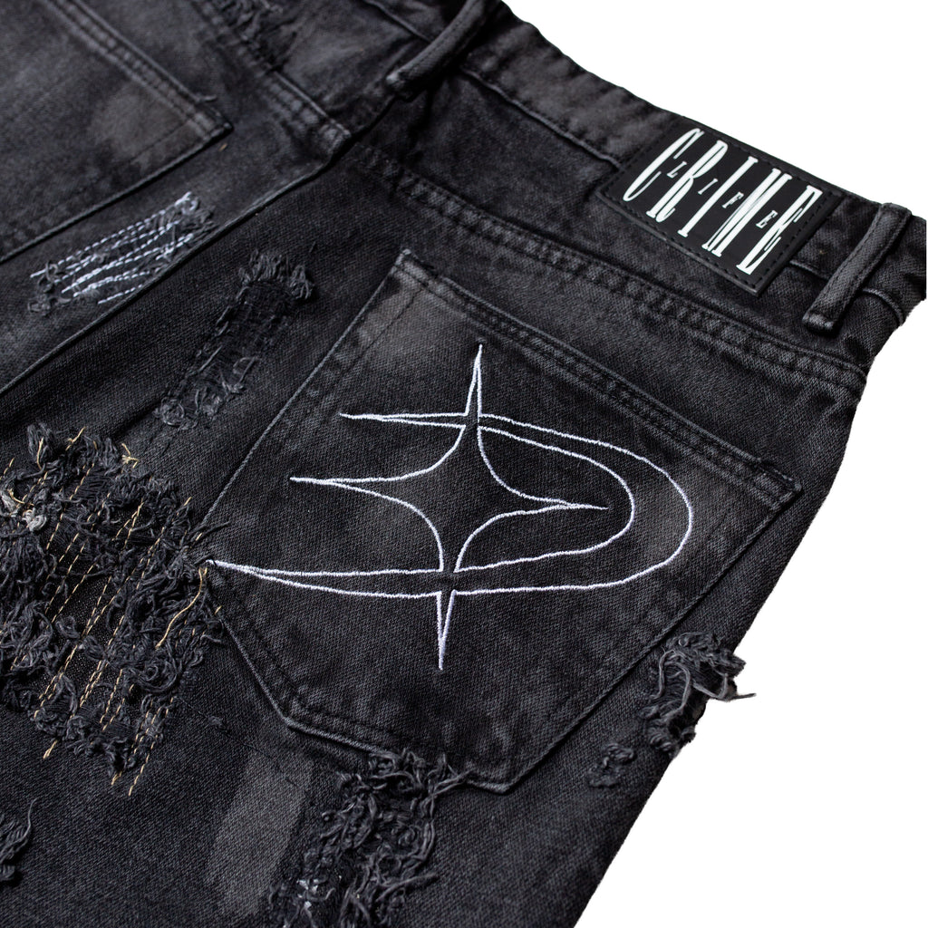 MIDNIGHT DESTROYED FLARED JEANS