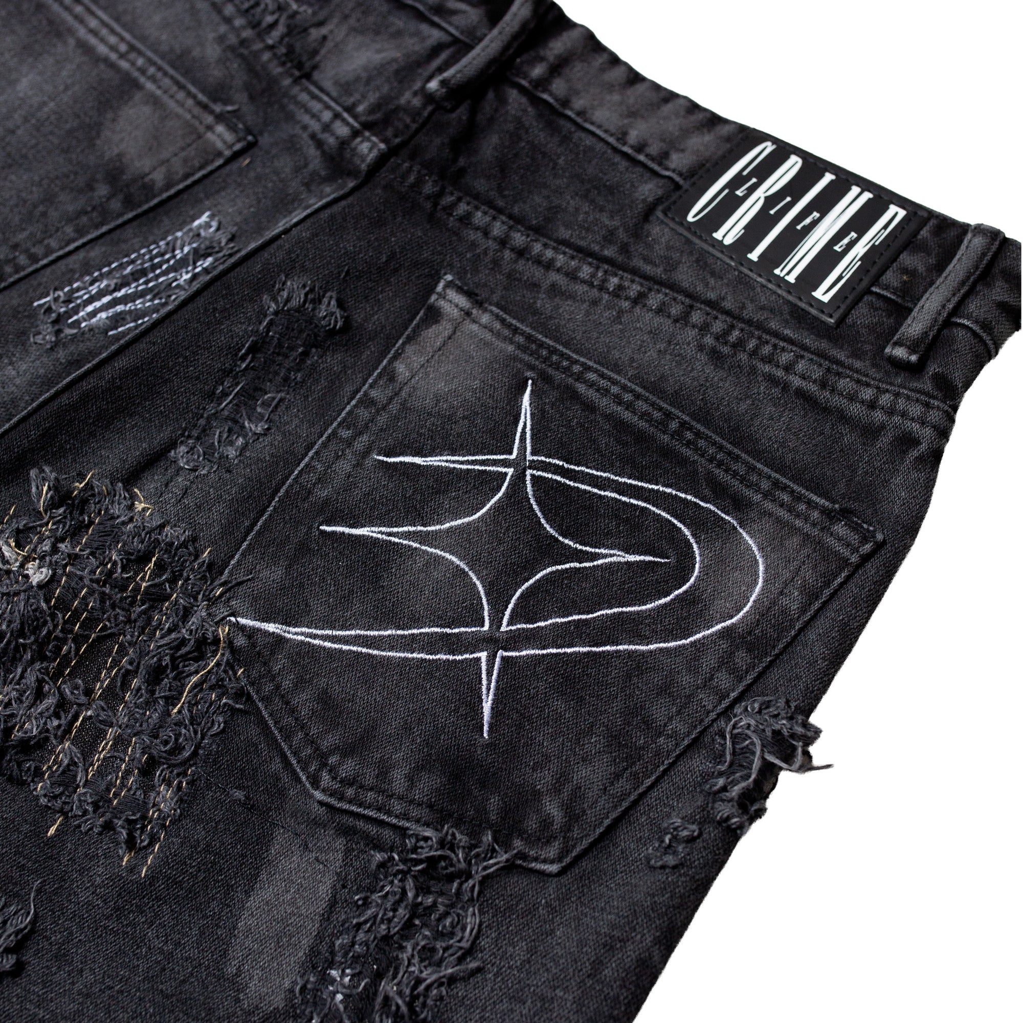 MIDNIGHT DESTROYED FLARED JEANS