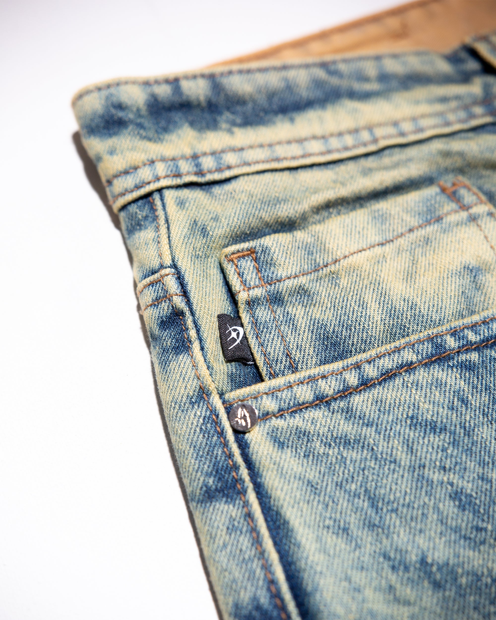 ACID GRID DENIM JEANS